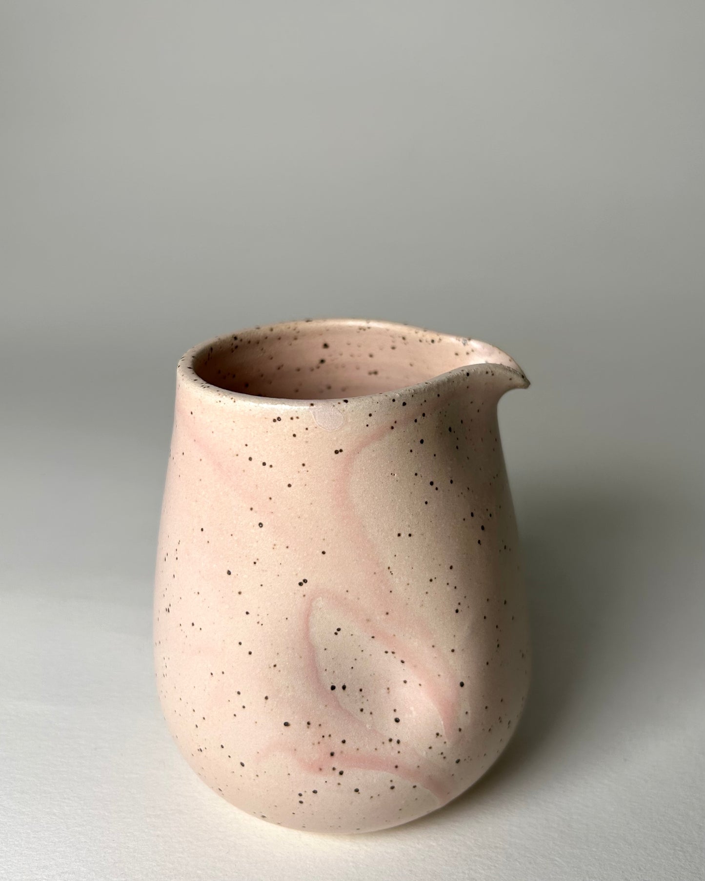 Speckled Pouring Bird.