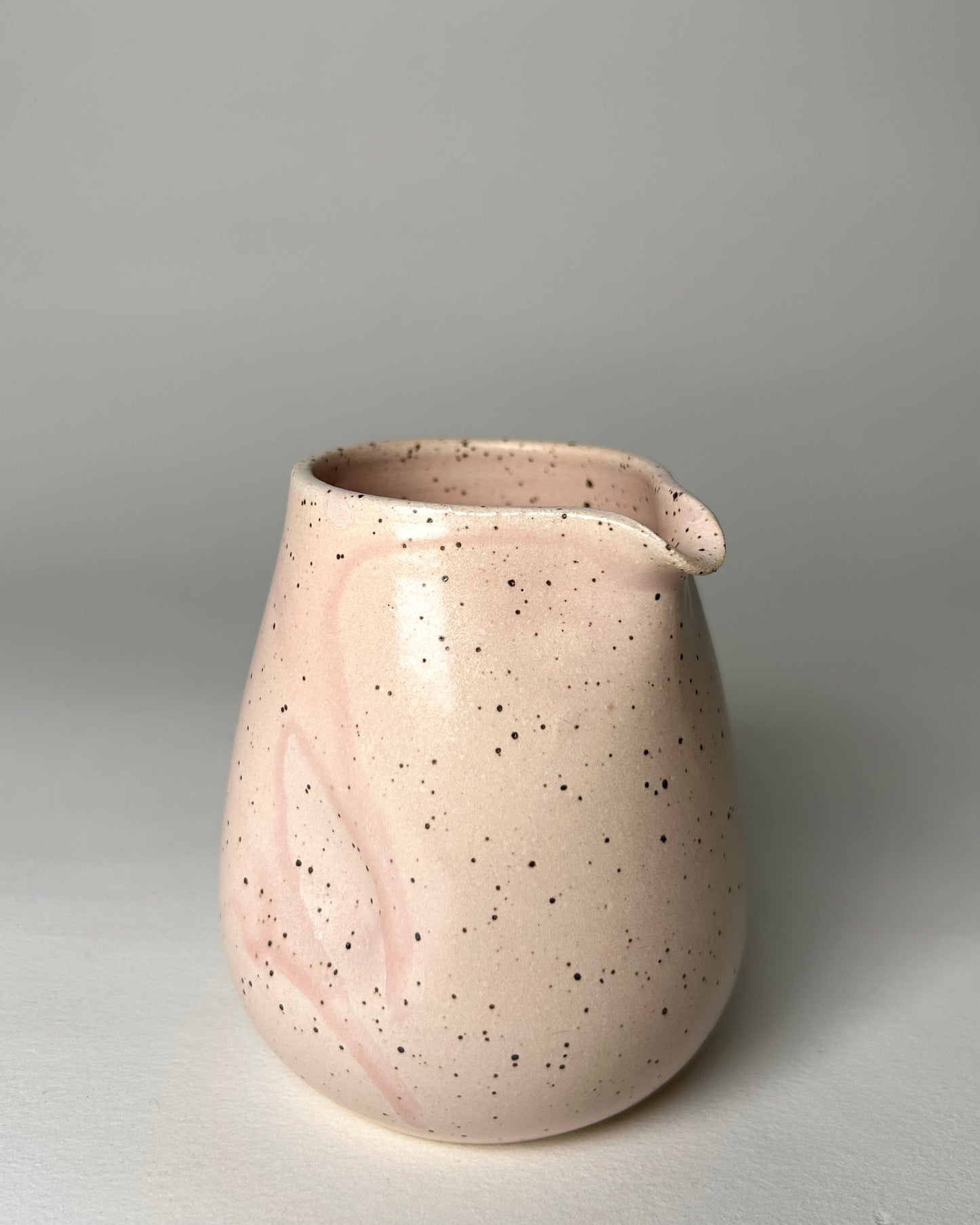 Speckled Pouring Bird.