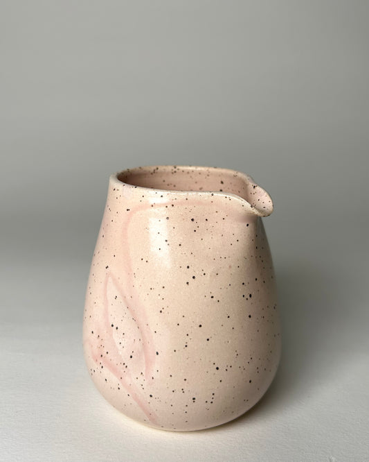 Speckled Pouring Bird.